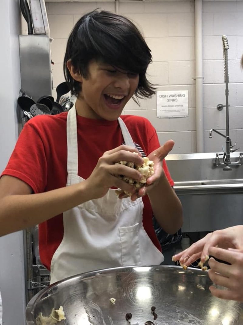 teen learning to cook